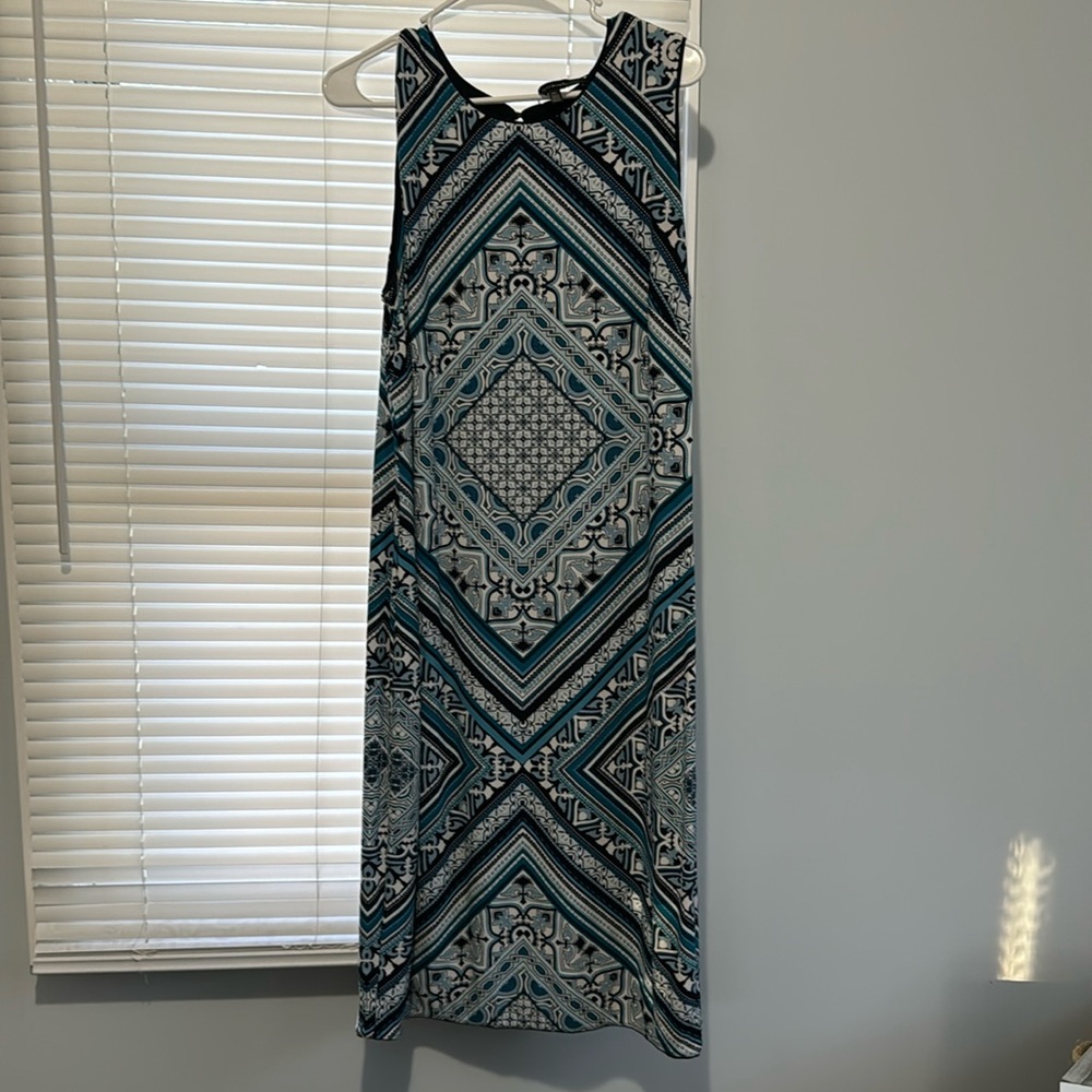 Reversible blue pattern on one side. Navy on the other.